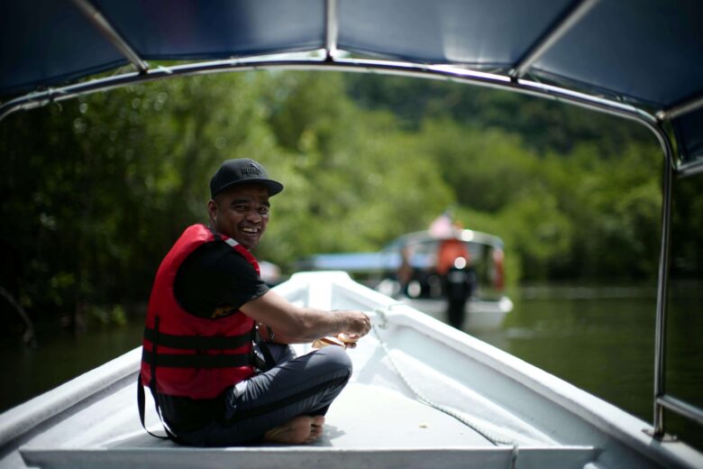 a man sitting on a boat