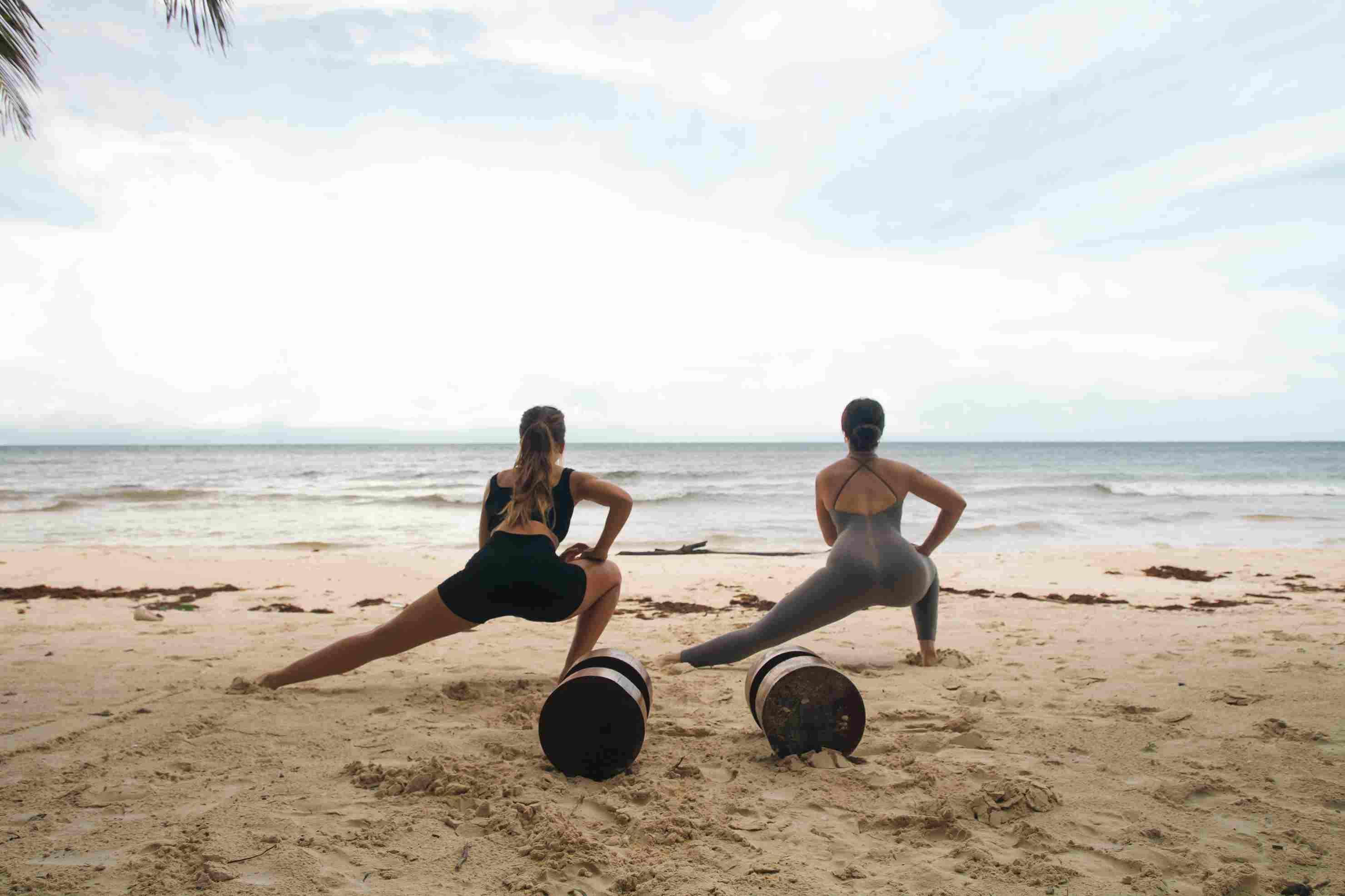 two girls doing yoga at Casa Nalum