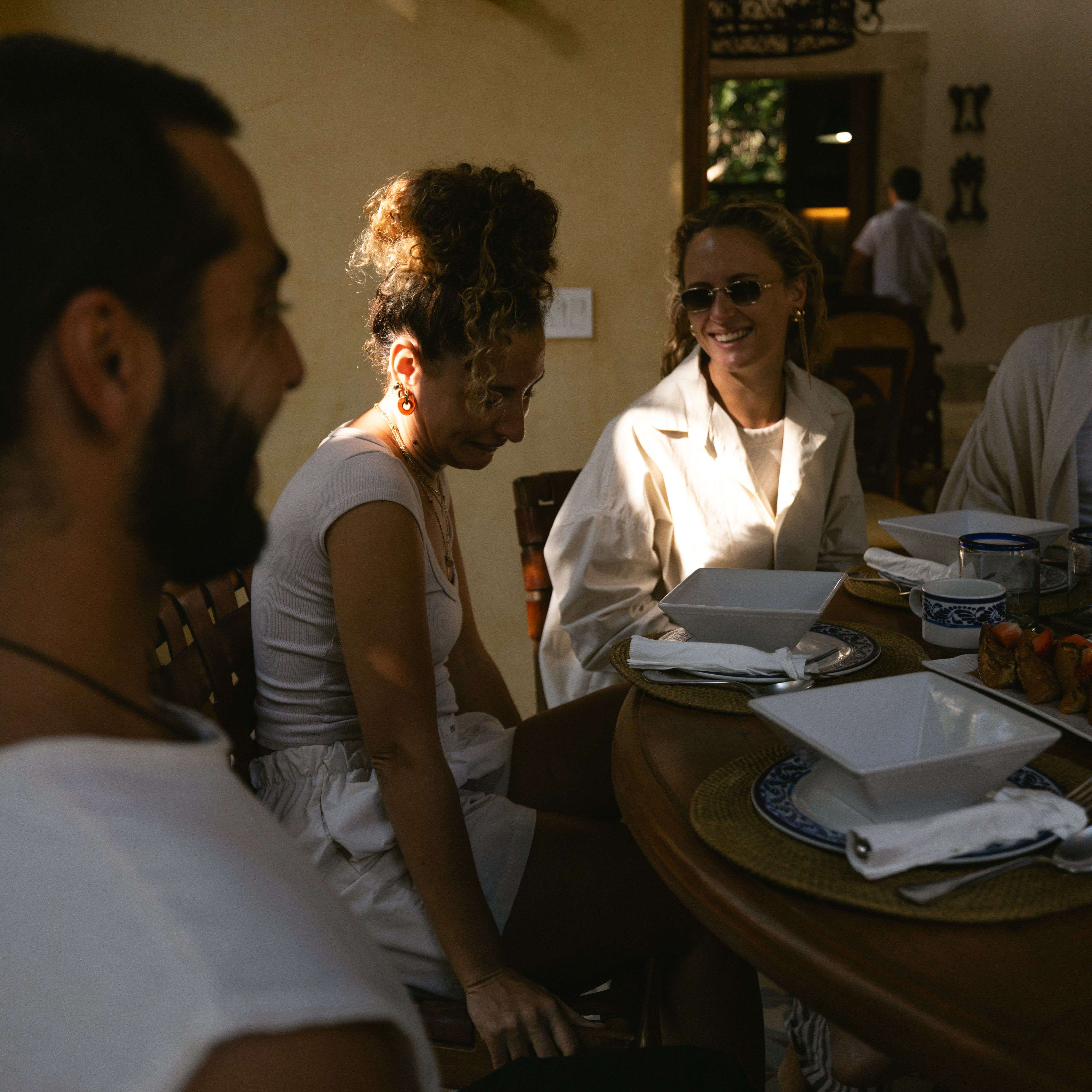 People enjoying breakfast at Hacienda Chekul