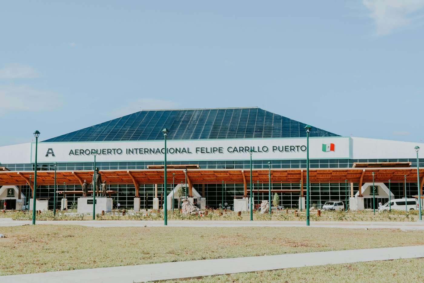 Daytime view of Felipe Carrillo Puerto International Airport in Mexico with clear blue sky.