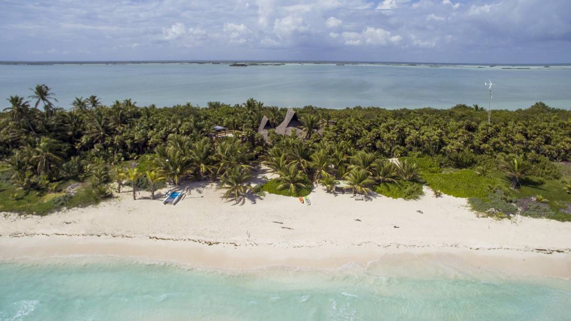Aerial view of Casa Nalum among the palms between the Sian Ka'an jungle and the Caribbean