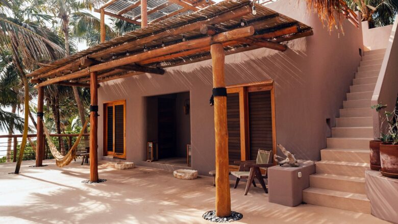 The terrace and outdoor staircase of Casa Nalum, a private villa in Sian Ka'an near Tulum