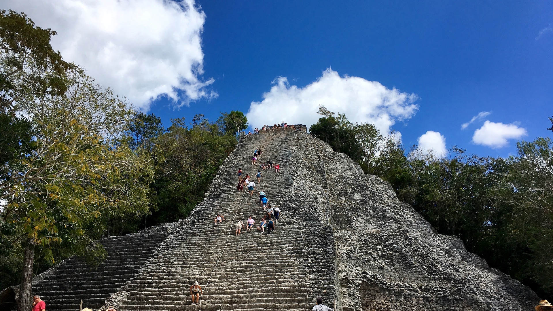 The Nohoch Mul pyramid rising above the jungle at the Cobá archaeological site