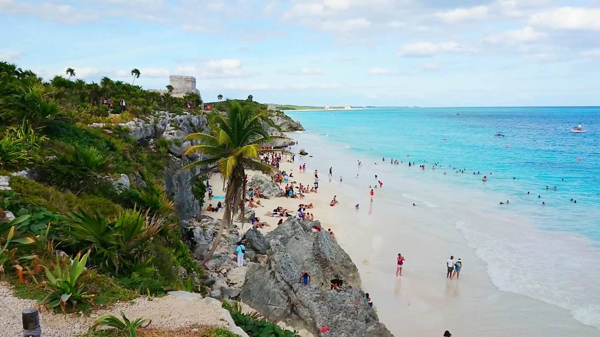 Beach below the Tulum ruins on the cliffs above the Caribbean